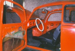 Removing the interior from the 1972 VW Beetle.
